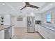 Modern kitchen with stainless steel appliances and granite countertops at 9393 Midnight Pass Rd # 704, Sarasota, FL 34242