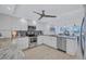 Modern kitchen with stainless steel appliances and granite countertops at 9393 Midnight Pass Rd # 704, Sarasota, FL 34242