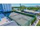 Well-maintained tennis courts with waterfront views at 9393 Midnight Pass Rd # 704, Sarasota, FL 34242