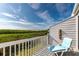 Private deck with lounge chair and water view at 941 Waterside Ln, Bradenton, FL 34209