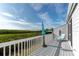 Private deck with lounge chair and water view at 941 Waterside Ln, Bradenton, FL 34209