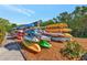 Community kayak storage with many kayaks available for resident use at 941 Waterside Ln, Bradenton, FL 34209