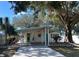 Charming mid-century modern home with carport and mature landscaping at 970 S Allendale Ave, Sarasota, FL 34237