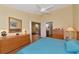 Main bedroom with access to bathroom and living room at 1229 Spoonbill Landings Cir, Bradenton, FL 34209