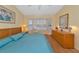 King-size bed, water views, wood floors, and ample light at 1229 Spoonbill Landings Cir, Bradenton, FL 34209