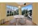 Bright breakfast nook with a table and chairs, overlooking the backyard at 1229 Spoonbill Landings Cir, Bradenton, FL 34209