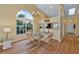 Bright dining area with glass table and hardwood floors at 1229 Spoonbill Landings Cir, Bradenton, FL 34209