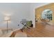 Home office with keyboard, chair and view of dining area at 1229 Spoonbill Landings Cir, Bradenton, FL 34209