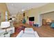 Open living space with water view and access to bedroom at 1229 Spoonbill Landings Cir, Bradenton, FL 34209