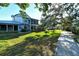 Private patio and lush landscaping near walking path at 1243 Siesta Bayside Dr # D, Sarasota, FL 34242