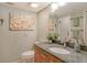 Bathroom with granite vanity and walk-in shower at 1243 Siesta Bayside Dr # D, Sarasota, FL 34242