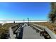 Convenient boardwalk access to the sandy beach at 1243 Siesta Bayside Dr # D, Sarasota, FL 34242