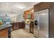 Modern kitchen with stainless steel appliances at 1243 Siesta Bayside Dr # D, Sarasota, FL 34242