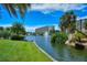 Beautiful pond with fountain and lush landscaping at 1243 Siesta Bayside Dr # D, Sarasota, FL 34242