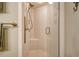 Walk-in shower with glass enclosure and seat at 1243 Siesta Bayside Dr # D, Sarasota, FL 34242