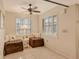 Bright sitting room with two comfy window seats at 1243 Siesta Bayside Dr # D, Sarasota, FL 34242