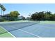 Two well-maintained tennis courts in the community at 1243 Siesta Bayside Dr # D, Sarasota, FL 34242