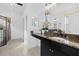 Elegant bathroom with granite vanity and a walk-in shower at 12826 Del Corso Loop, Bradenton, FL 34211