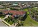 Expansive property features a beautiful home with a private pool, well-manicured lawn, and a three-car garage at 13408 Swiftwater Way, Bradenton, FL 34211