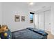 Neutral bedroom with carpet, a closet, and plenty of light from the window at 13408 Swiftwater Way, Bradenton, FL 34211
