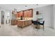 Spacious kitchen with an island cooktop, and stainless steel appliances at 13408 Swiftwater Way, Bradenton, FL 34211