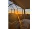Relaxing covered patio with a view of the sunset at 13408 Swiftwater Way, Bradenton, FL 34211