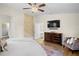 Bright bedroom with large bed, dresser, and calming decor at 13623 2Nd E Ave, Bradenton, FL 34212