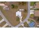 Property's aerial view showing house and surrounding area at 15026 Dania Ave, Port Charlotte, FL 33953