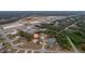 Broad view of the house and its surroundings at 15026 Dania Ave, Port Charlotte, FL 33953