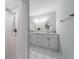 Bathroom with double vanity and shower at 15026 Dania Ave, Port Charlotte, FL 33953