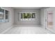 Bright dining area with tile floors and access to backyard at 15026 Dania Ave, Port Charlotte, FL 33953