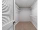 Large walk-in closet with wire shelving at 15026 Dania Ave, Port Charlotte, FL 33953