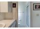 Clean bathroom with shower stall and single sink vanity at 1610 Cypress Point Ct, Venice, FL 34293