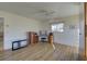 Bedroom with wood flooring, desk, and built-in shelves at 1610 Cypress Point Ct, Venice, FL 34293