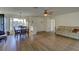 Dining area with hardwood floors and a wooden table set at 1610 Cypress Point Ct, Venice, FL 34293