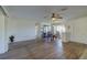 Dining room features hardwood floors and a large window at 1610 Cypress Point Ct, Venice, FL 34293