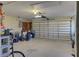 Attached garage with ample space for storage and vehicles at 1610 Cypress Point Ct, Venice, FL 34293