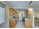 Kitchen with stainless steel appliances and granite countertops at 1610 Cypress Point Ct, Venice, FL 34293