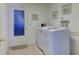 Laundry room with washer, dryer, and exterior access at 1610 Cypress Point Ct, Venice, FL 34293