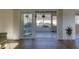 Bright and airy sunroom with tiled floor and glass sliding doors at 1610 Cypress Point Ct, Venice, FL 34293