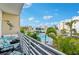 Enjoy resort-style pool views from this private balcony at 1703 N Tamiami Trl # 209, Sarasota, FL 34234