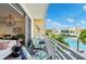 Spacious balcony overlooking pool; access from living area at 1703 N Tamiami Trl # 209, Sarasota, FL 34234