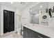 Bathroom boasts a vanity with modern fixtures and a walk-in shower at 1703 N Tamiami Trl # 209, Sarasota, FL 34234