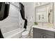 Bathroom features a bathtub, toilet and vanity with modern finishes at 1703 N Tamiami Trl # 209, Sarasota, FL 34234