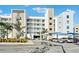 Contemporary building exterior with covered parking at 1703 N Tamiami Trl # 209, Sarasota, FL 34234