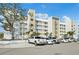 Modern building exterior with ample parking at 1703 N Tamiami Trl # 209, Sarasota, FL 34234