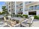 Relaxing outdoor fire pit with comfortable seating at 1703 N Tamiami Trl # 209, Sarasota, FL 34234