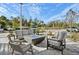 Relaxing outdoor fire pit area with comfortable seating at 1703 N Tamiami Trl # 209, Sarasota, FL 34234