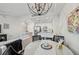 Open concept kitchen and dining area with modern appliances and stylish decor at 1703 N Tamiami Trl # 209, Sarasota, FL 34234