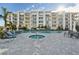 Inviting pool and spa area with comfortable seating at 1703 N Tamiami Trl # 209, Sarasota, FL 34234